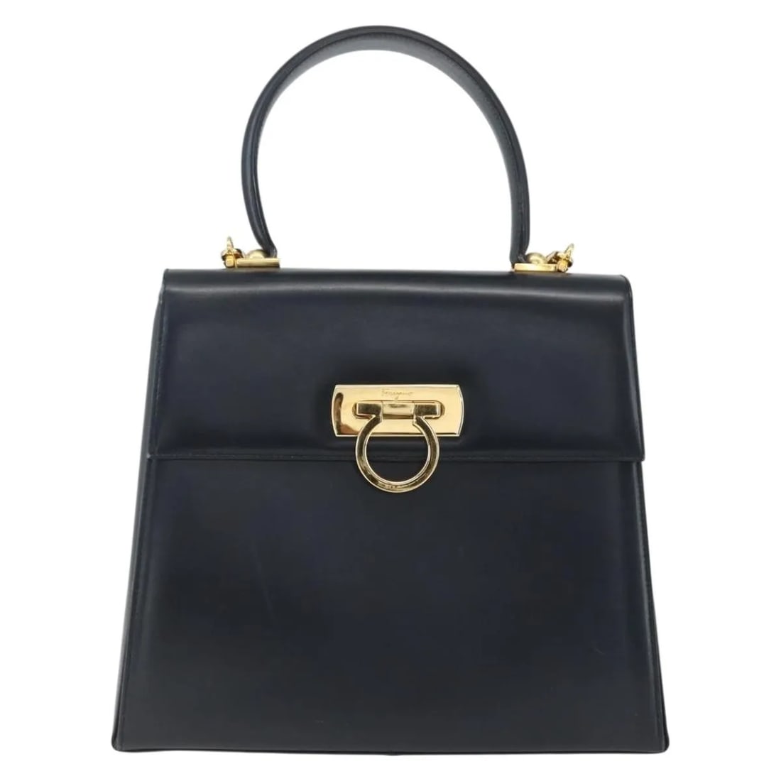 Gancini Navy Leather Convertible Bag by Salvatore Ferragamo: Gancini Navy Leather Convertible Bag by Salvatore Ferragamo This Salvatore Ferragamo Gancini Convertible Top Handle Bag is crafted from navy leather and features both a top handle and a convertible sh