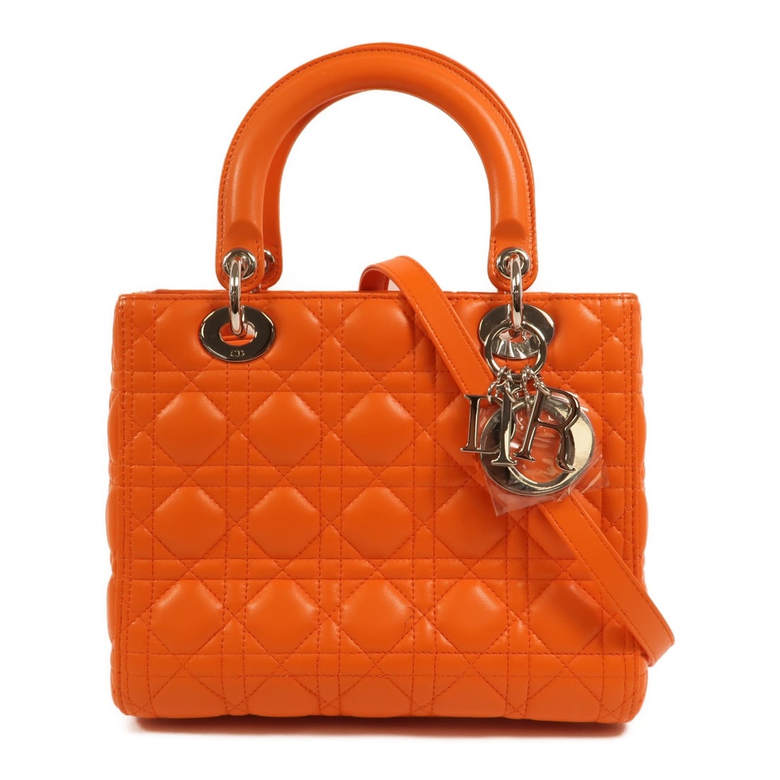 Dior Lady Dior Medium Lambskin 2 Way Shoulder Bag Orange: Dior Lady Dior Medium Lambskin 2 Way Shoulder Bag Orange A Lady Dior Medium 2-way shoulder bag in orange lambskin leather with silver-tone hardware. It features a top handle and a shoulder strap, alon