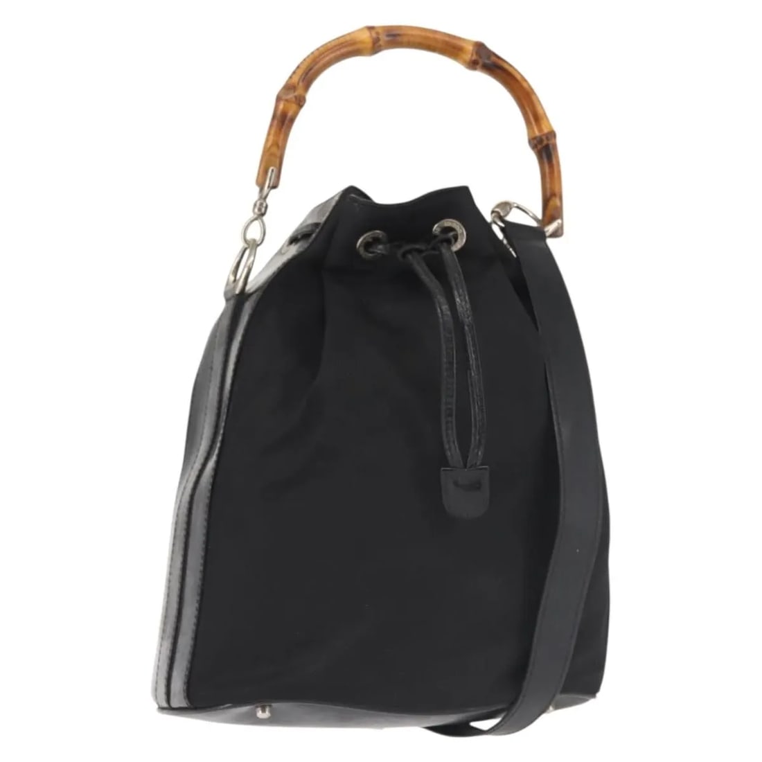 Vintage Gucci Black Nylon and Leather Bucket Handbag with Bamboo Handle: Vintage Gucci Black Nylon and Leather Bucket Handbag with Bamboo Handle This vintage Gucci Bamboo Bucket Bag features a black nylon body with leather accents. Designed for women, it offers a classic b