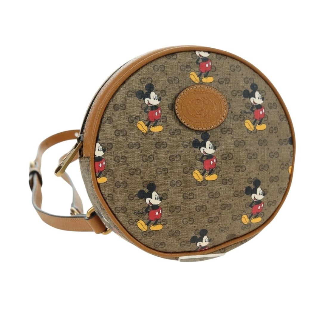 Gucci 603730 Micro GG Supreme PVC Leather Backpack Beige Gold: Gucci 603730 Micro GG Supreme PVC Leather Backpack Beige Gold Gucci Micro GG Supreme Disney backpack in beige and gold, made in Italy. It is crafted from PVC leather and Micro Small GG canvas, and com