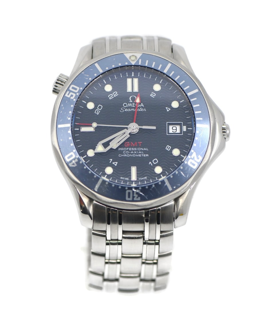 Omega Seamaster GMT 41mm Blue Dial Steel Diver Watch: Omega Seamaster GMT 41mm Blue Dial Steel Diver Watch This Omega Seamaster 300M GMT wristwatch features a 41 mm stainless steel case with a blue unidirectional rotating bezel and an ocean wave-patterne