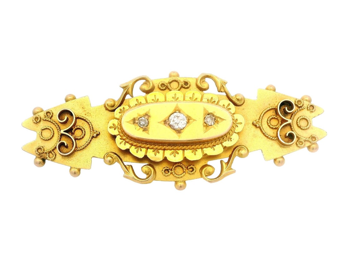Victorian 9k Gold 0.15ct Old Diamond Elongated Brooch: Victorian 9k Gold 0.15ct Old Diamond Elongated Brooch This exquisite Antique English Victorian pin brooch is crafted from solid 9k yellow gold and features three natural genuine diamonds in an elegant