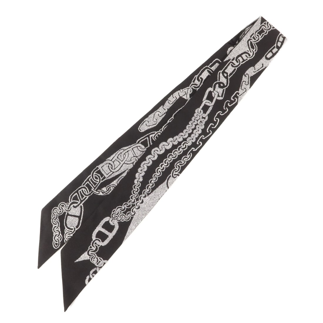 Hermes Twilly Silk Scarf Black with Storage Box: Hermes Twilly Silk Scarf Black with Storage Box Hermes Twilly scarf in black silk, presented in pristine A+ condition. The item includes a storage box and measures 85 cm x 5 cm (33.5 in x 2.0 in). Spe