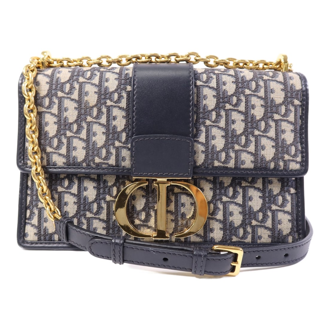 Dior 30 Montaigne Chain Shoulder Bag Navy Oblique Canvas 86MA0222: Dior 30 Montaigne Chain Shoulder Bag Navy Oblique Canvas 86MA0222 Christian Dior 30 Montaigne Chain bag, model 86MA0222, in navy. It is made from canvas with an Oblique jacquard/leather design and fea