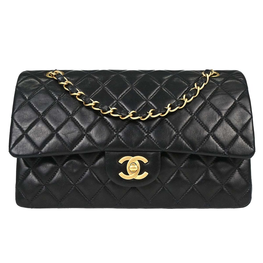 CHANEL Classic Double Flap Medium Shoulder Bag Black Lambskin: CHANEL Classic Double Flap Medium Shoulder Bag Black Lambskin Chanel Medium Classic Double Flap shoulder bag in black lambskin leather with a turn-lock closure and shoulder strap. This women's bag fea
