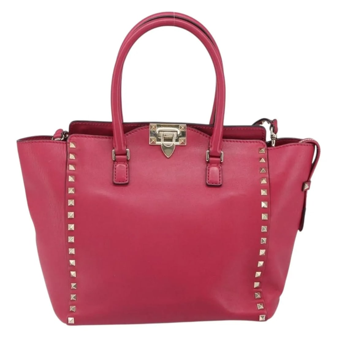 Pink Leather Tote Valentino Garavani Rockstud 25cm x 25cm x 13cm: Pink Leather Tote Valentino Garavani Rockstud 25cm x 25cm x 13cm This Valentino Garavani Rockstud Tote is crafted from leather in a pink shade, designed for female use. The tote features a rigid struc