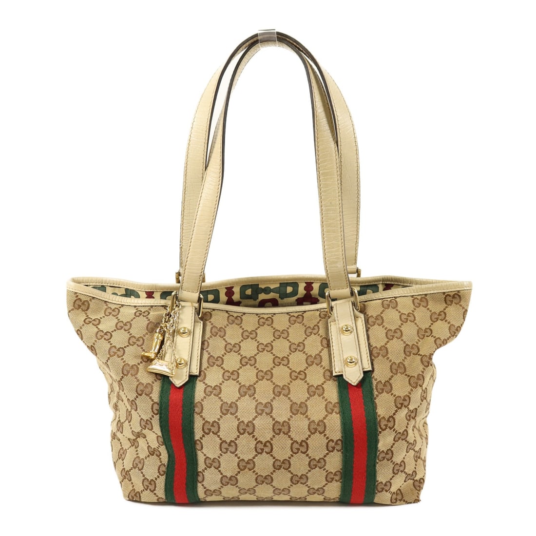 GUCCI 137396 GG Canvas Shoulder Bag Brown White Gold Tone: GUCCI 137396 GG Canvas Shoulder Bag Brown White Gold Tone Gucci shoulder bag in GG canvas with a brown and white colorway. It is designed for women and made in Italy. The bag includes an inside zip po