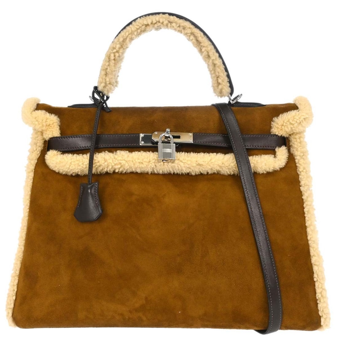 Hermes Kelly 35 Brown Leather Top Handle 2way Handbag: Hermes Kelly 35 Brown Leather Top Handle 2way Handbag Hermes Kelly 35 2way handbag in brown Doblis mouton plush teddy style with a top handle design. It features a turn lock closure, gold-tone hardwar