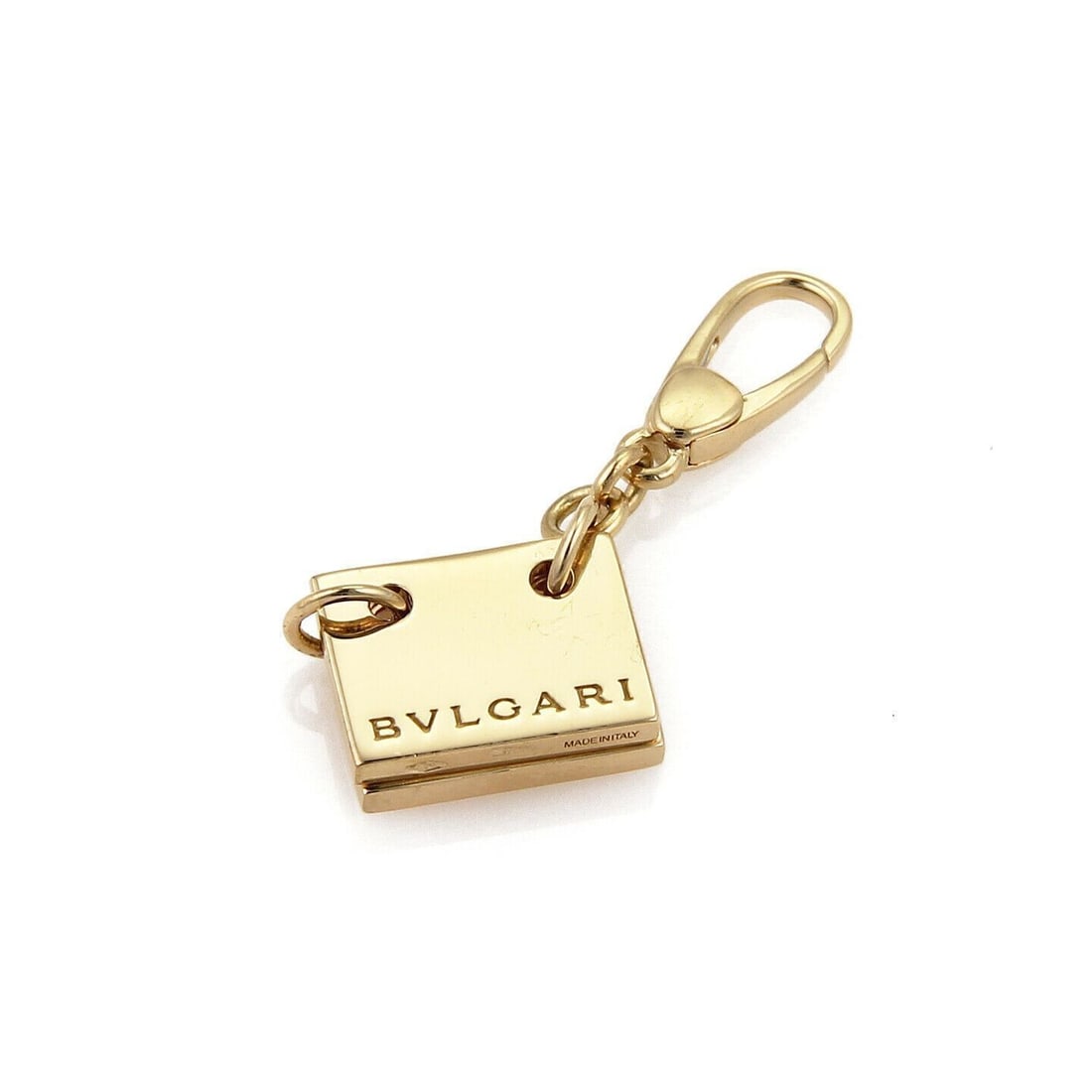 18k Yellow Gold Binder Charm Pendant Bvlgari Signature 2 Page: 18k Yellow Gold Binder Charm Pendant Bvlgari Signature 2 Page A pre-owned Bvlgari Signature charm pendant designed as a miniature two-page binder. Crafted in 18k yellow gold, it features a detailed bi