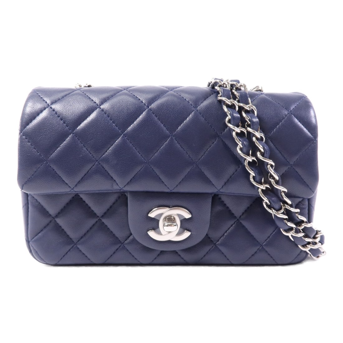CHANEL Mini Classic 20 Navy Lambskin Chain Shoulder Bag CC SHW: CHANEL Mini Classic 20 Navy Lambskin Chain Shoulder Bag CC SHW A CHANEL CC SHW Mini Classic 20 Chain Shoulder Bag in navy lambskin leather. This shoulder bag is designed for women and features a turn 
