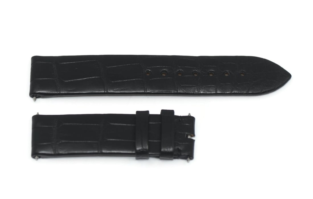 Jaquet Droz 18mm Black Leather Wristwatch Band: Jaquet Droz 18mm Black Leather Wristwatch Band This is a pre-owned Jaquet Droz black leather wristwatch strap, crafted in Switzerland. The strap features a band width of 18mm at the lugs and tapers to