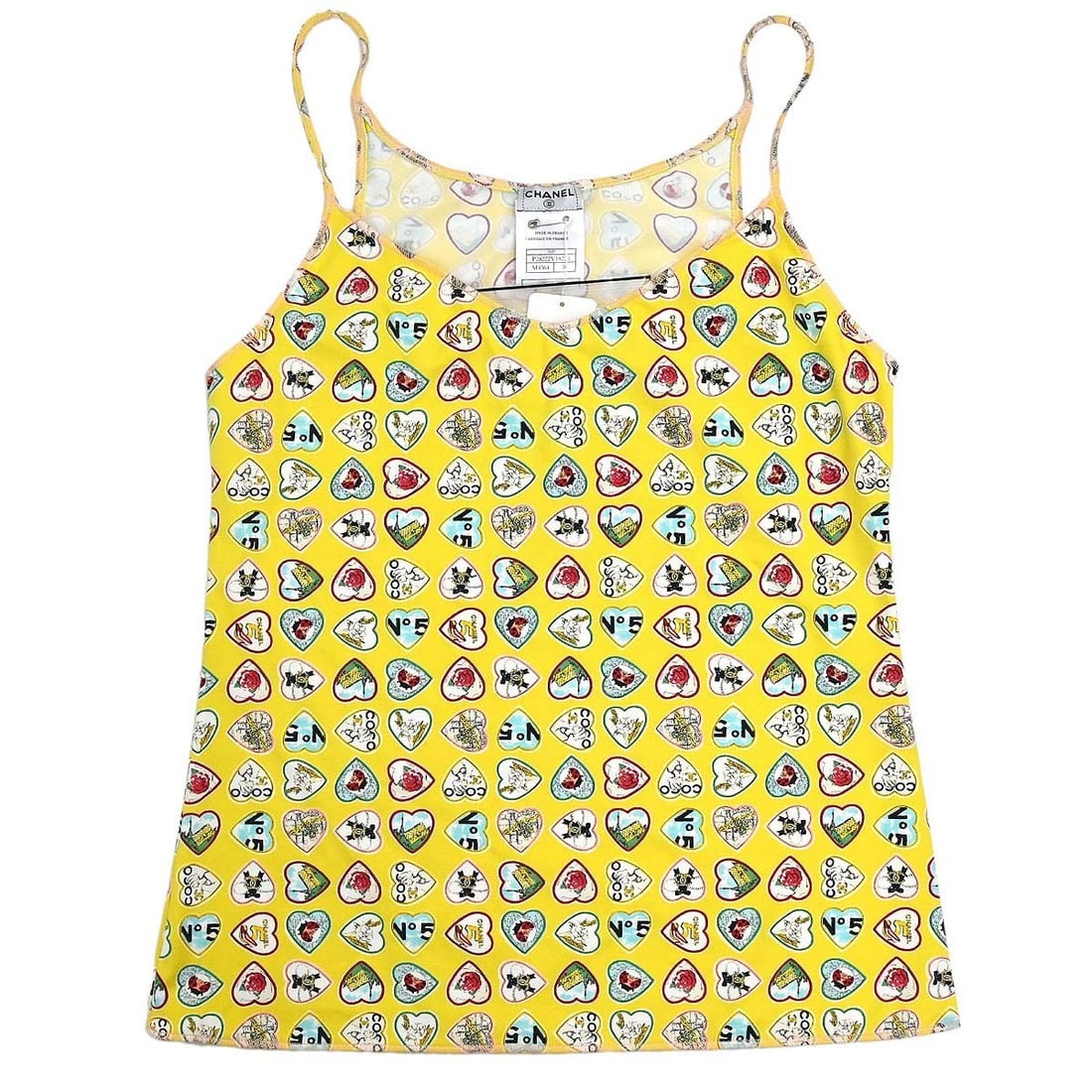 CHANEL Valentine Yellow Sleeveless Camisole Tank FR 38: CHANEL Valentine Yellow Sleeveless Camisole Tank FR 38 Vintage Chanel Valentine camisole top in yellow with a slim fit and sleeveless design. This women's tank-style top is made in France and is suite