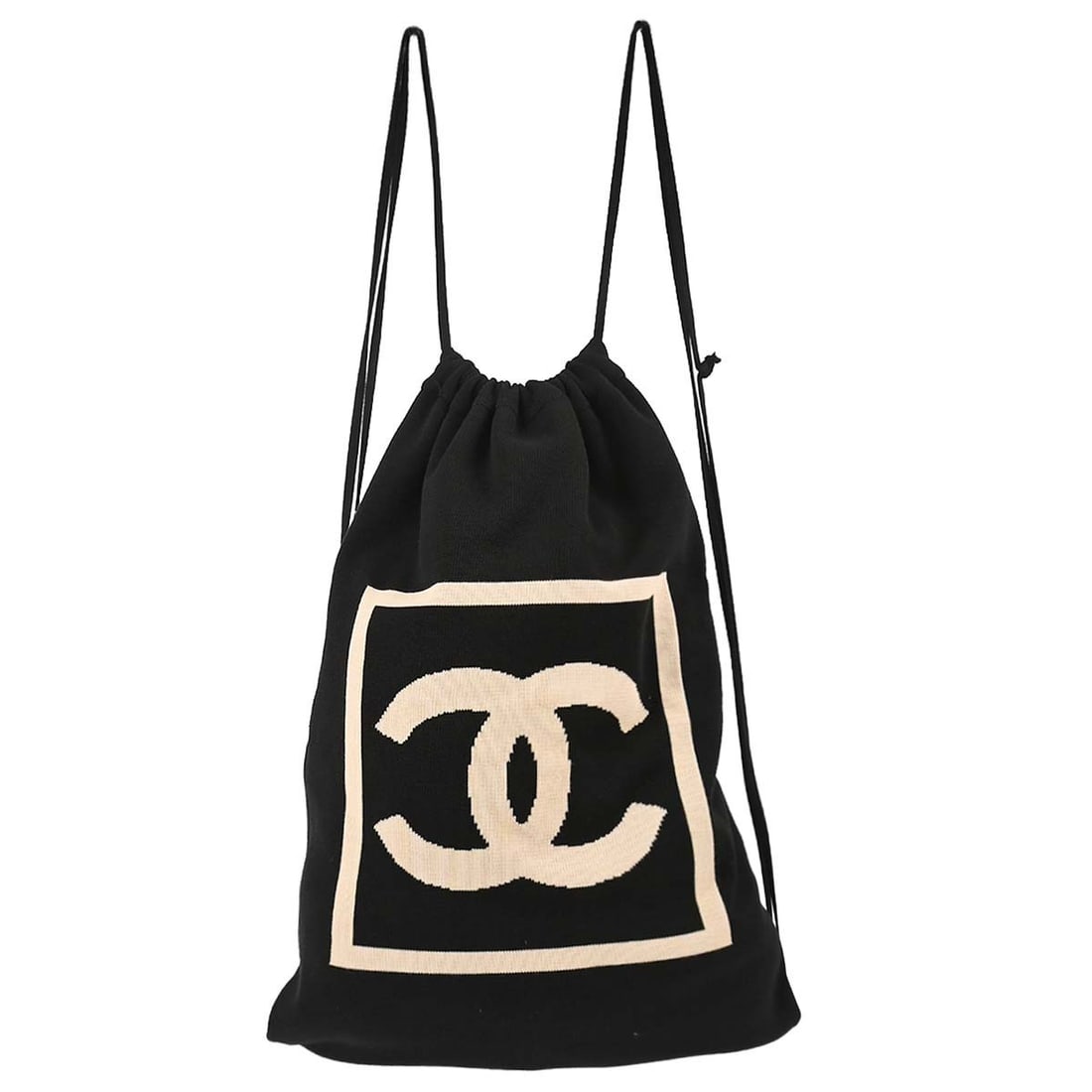 CHANEL Sport Line Black Drawstring Backpack: CHANEL Sport Line Black Drawstring Backpack Chanel Sport Line drawstring backpack in black with beige accents. This women's medium backpack features a shoulder strap, magnetic zip closure, and interio