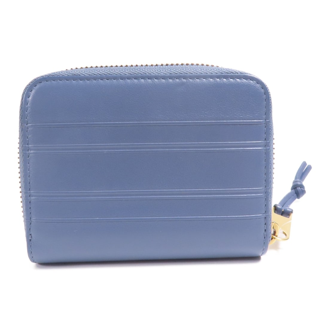 Dior CD blue calfskin coin case card holder: Dior CD blue calfskin coin case card holder Christian Dior coin case in blue calfskin leather with gold-tone hardware. It features a fastener pocket and an open compartment, with space for up to 4 car