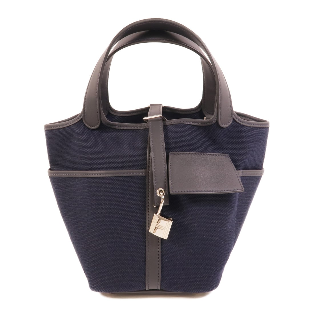 Hermes Picotin Cargo PM Canvas Handbag Bleu Marine PHW: Hermes Picotin Cargo PM Canvas Handbag Bleu Marine PHW Hermes Picotin Cargo PM handbag in canvas and Bleu Marine. It is a women's regular-size handbag made in France, with a blue exterior and blue fra