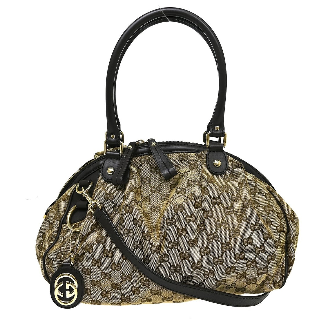 Gucci GG Beige Canvas Leather 2way Tote Handbag with Strap Charm: Gucci GG Beige Canvas Leather 2way Tote Handbag with Strap Charm Gucci GG tote handbag in beige canvas and leather, featuring the Gucci GG pattern and a 2way design with a shoulder strap and bag charm