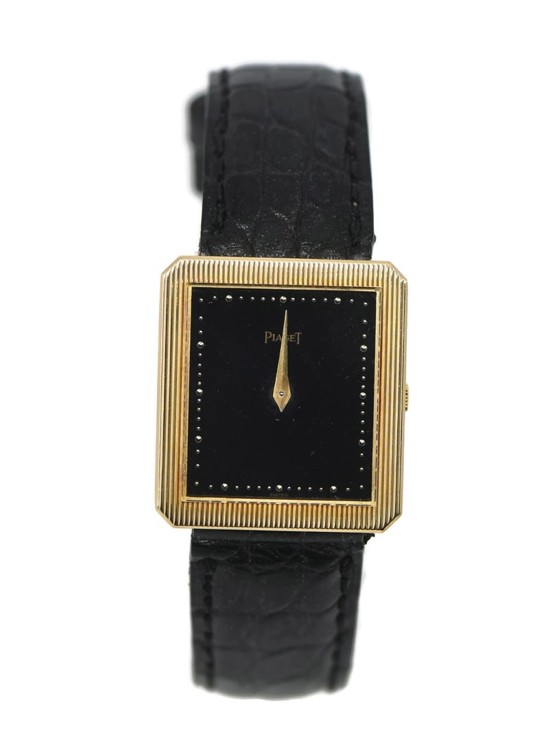 18K Yellow Gold Piaget Protocole Manual Wristwatch Ref 9154 Black Dial: 18K Yellow Gold Piaget Protocole Manual Wristwatch Ref 9154 Black Dial This Piaget Protocole wristwatch features a refined 18K yellow gold case and a classic analog display. The watch is powered by a 