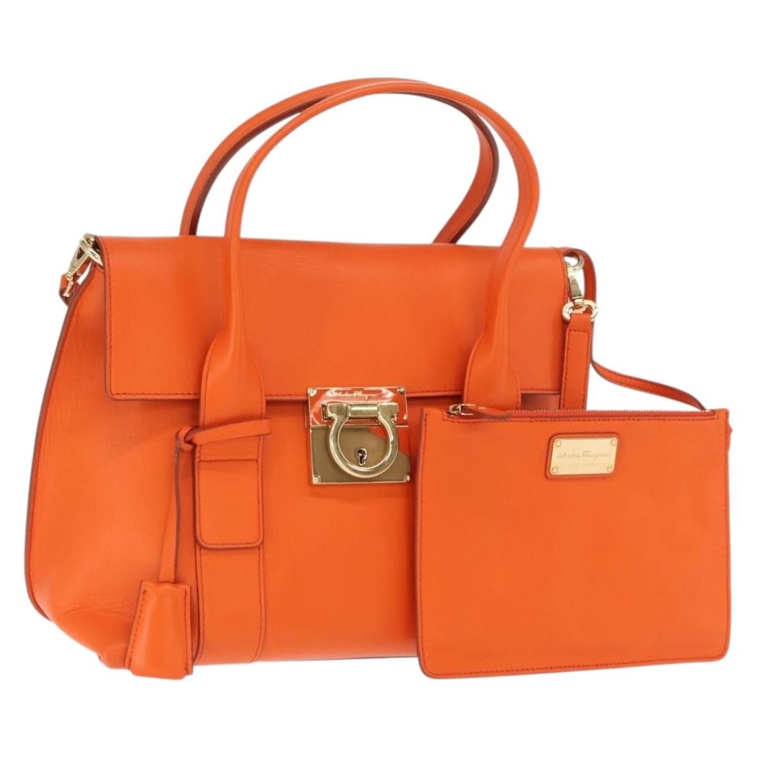 Salvatore Ferragamo Gancini Orange Gold Leather 2way Hand Bag: Salvatore Ferragamo Gancini Orange Gold Leather 2way Hand Bag This Salvatore Ferragamo Gancini handbag is crafted from orange leather with gold-tone accents. Designed for versatile use, it can be carr