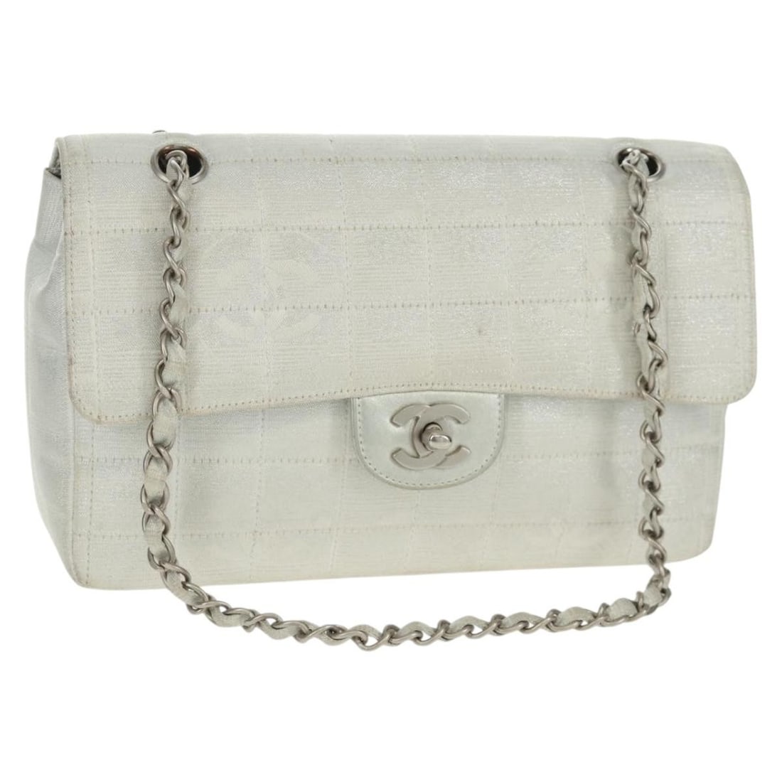 CHANEL Choco Bar 25 Silver Nylon Shoulder Bag Dust Bag Guarantee Card: CHANEL Choco Bar 25 Silver Nylon Shoulder Bag Dust Bag Guarantee Card This CHANEL Travel Line Choco Bar 25 chain shoulder bag is crafted from silver nylon and features the iconic CC logo. Designed for