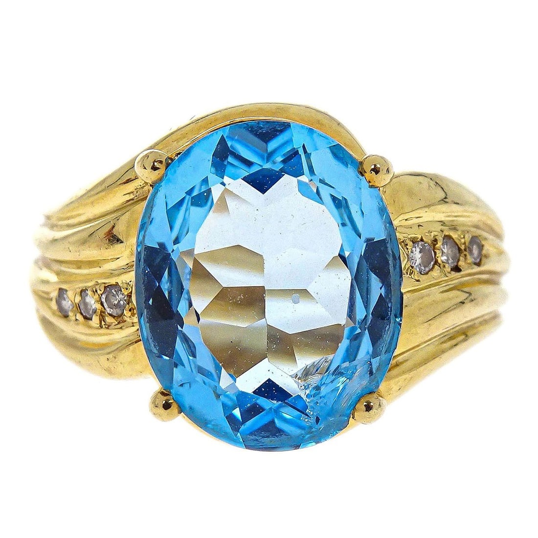 Vintage 14K Gold Ring Size 56 with Blue Topaz and Diamond: Vintage 14K Gold Ring Size 56 with Blue Topaz and Diamond Vintage 14K gold ring featuring a round blue topaz accented with diamond details. This no-brand ring is presented in very good condition with 
