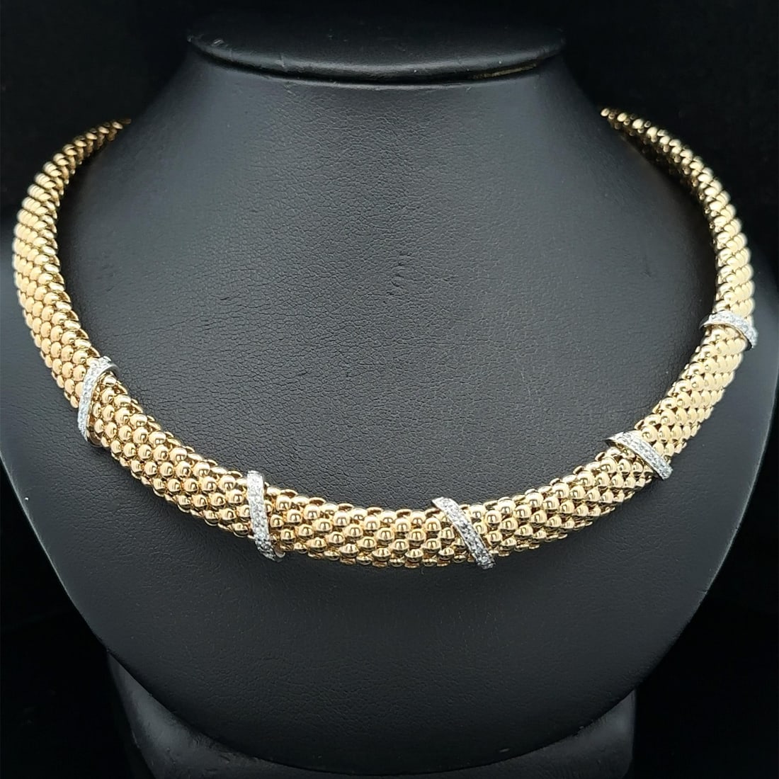Wide Beaded Choker Necklace in 14k Gold with Pave Diamond Stations: Wide Beaded Choker Necklace in 14k Gold with Pave Diamond Stations This choker necklace features a wide popcorn link design crafted from solid 14k yellow gold with accents of white gold. The necklace 
