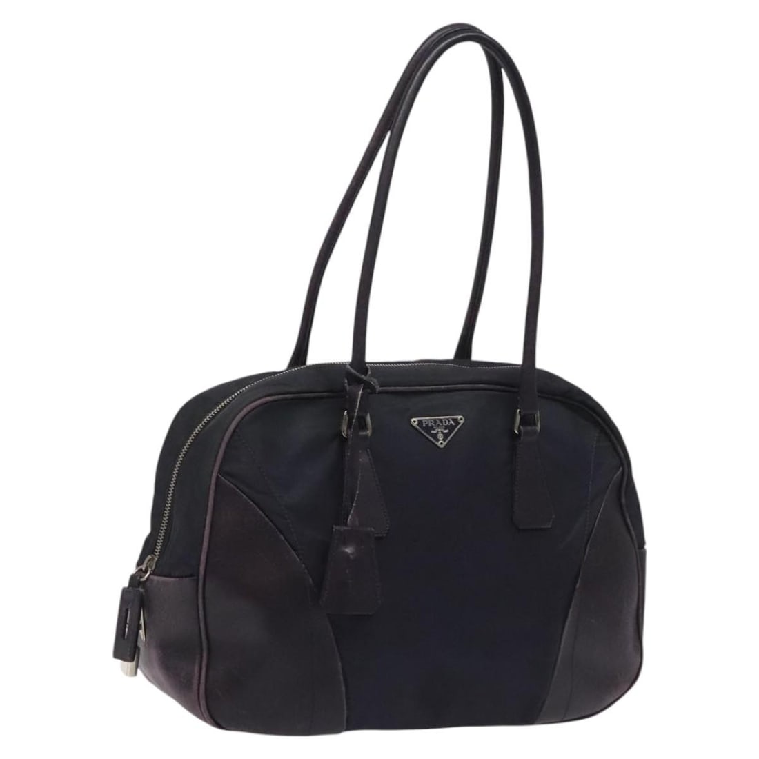 Prada Purple Nylon Shoulder Bag with Padlock and Key Accessories: Prada Purple Nylon Shoulder Bag with Padlock and Key Accessories This PRADA shoulder bag is crafted from purple nylon and features a classic silhouette suitable for women. Made in Italy, the bag offer