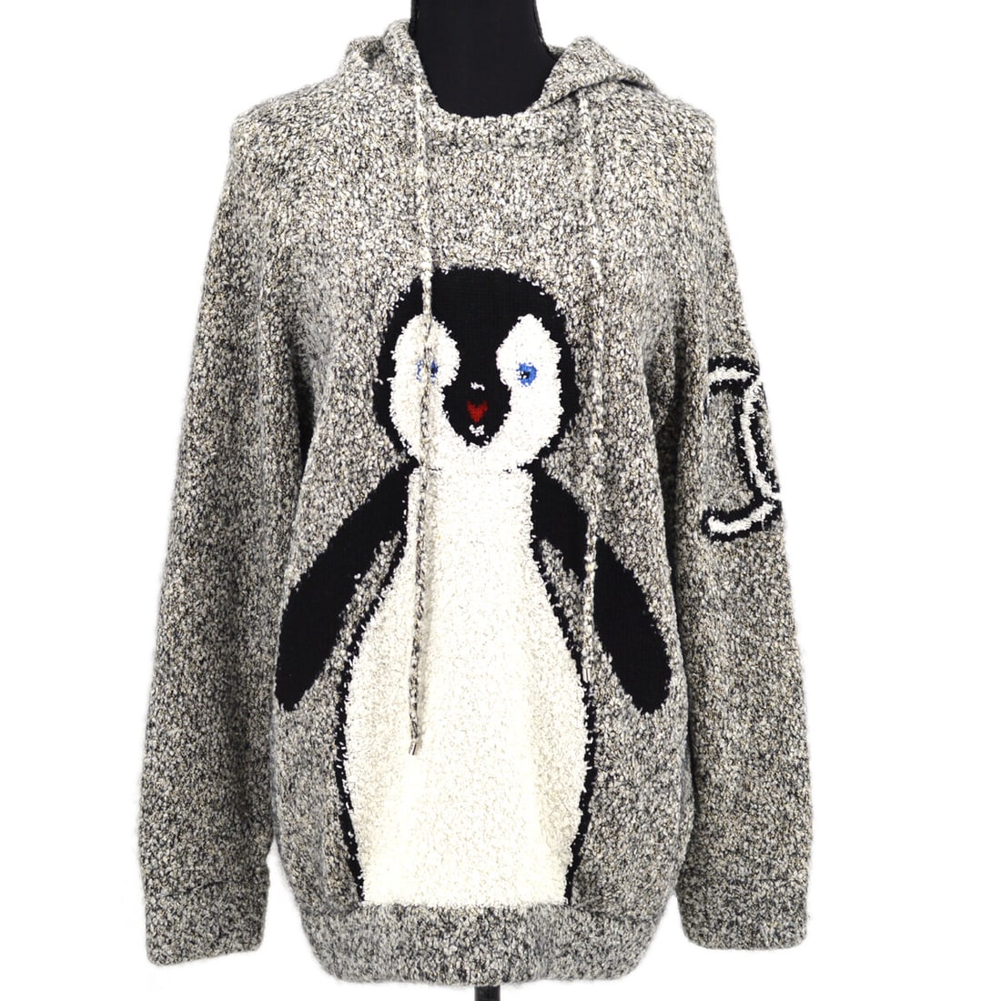 CHANEL 07A penguin motif hooded sweater dress gray size 42: CHANEL 07A penguin motif hooded sweater dress gray size 42 Gray Chanel knitted hoodie with a penguin motif and pullover styling. Made in Italy, this women's garment features long sleeves and a short s
