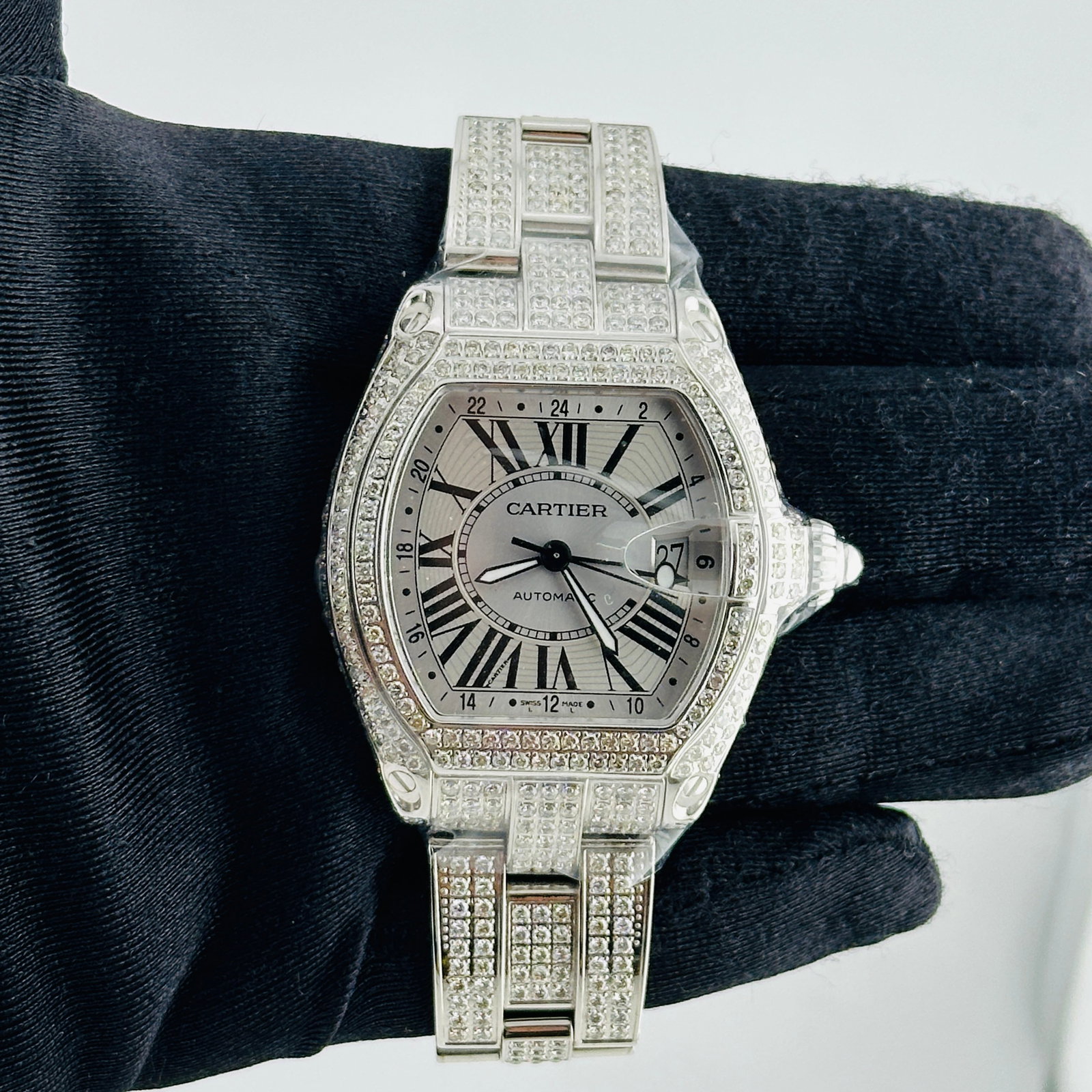 Cartier Roadster Ref 2722 Mens Watch Silver Roman Dial Diamond Bezel Bracelet: Cartier Roadster Ref 2722 Mens Watch Silver Roman Dial Diamond Bezel Bracelet This Cartier Roadster watch features a silver Roman numeral dial complemented by a diamond-set bezel and diamond bracelet.