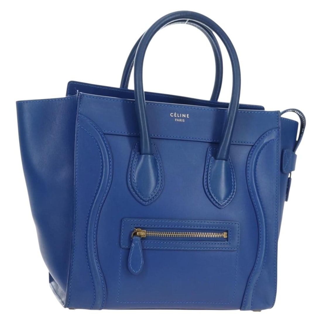 CELINE Micro Shopper Blue Leather Handbag with Dust Bag: CELINE Micro Shopper Blue Leather Handbag with Dust Bag CELINE Micro Shopper handbag in leather with a blue and gold color scheme. Made in Italy, this women's handbag comes with a dust bag and feature