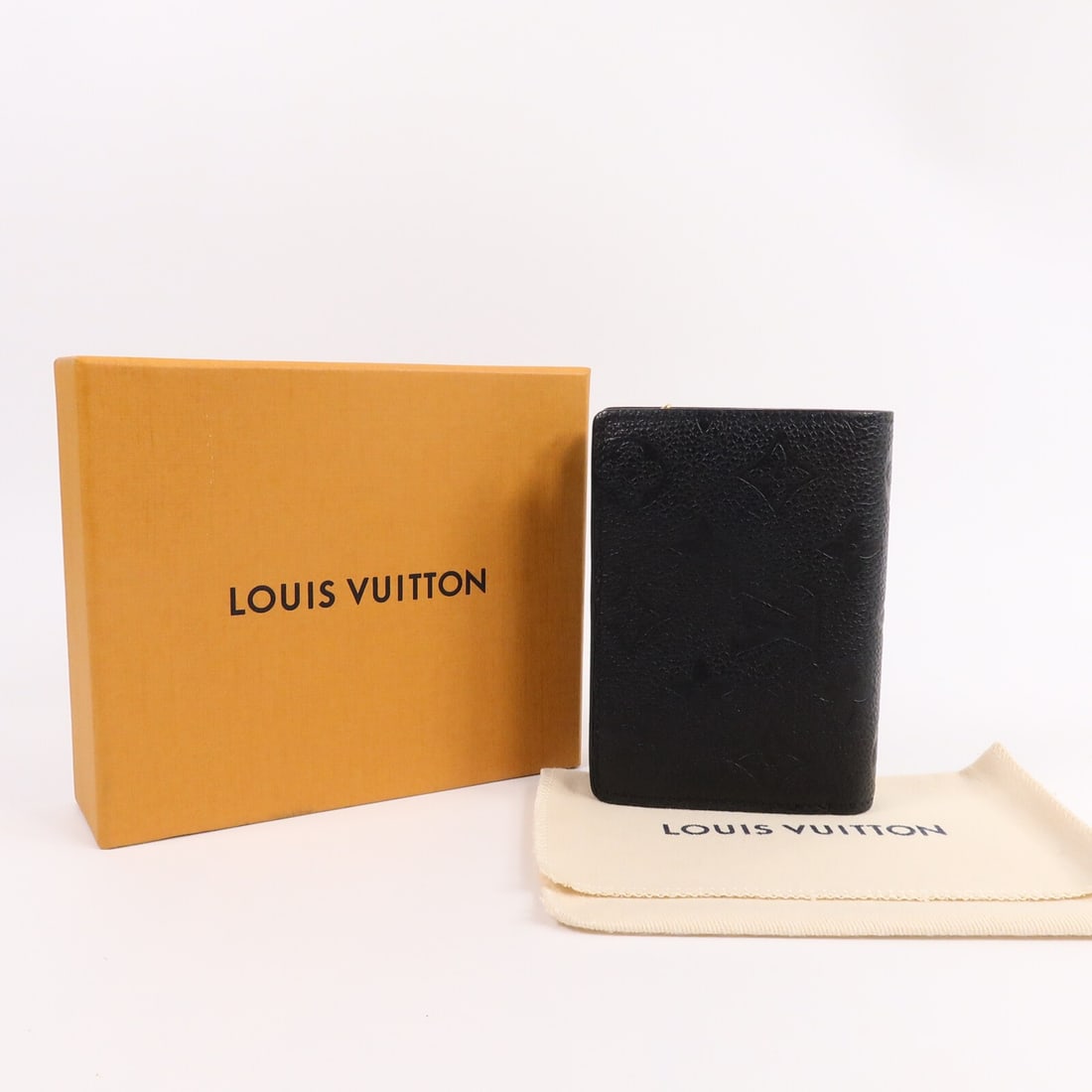 Louis Vuitton Clea Bi Fold Wallet M80151 Monogram Empreinte Black: Louis Vuitton Clea Bi Fold Wallet M80151 Monogram Empreinte Black Louis Vuitton Clea Wallet in black Monogram Empreinte and calfskin (cowhide), presented as a bi-fold wallet for women. It features a h