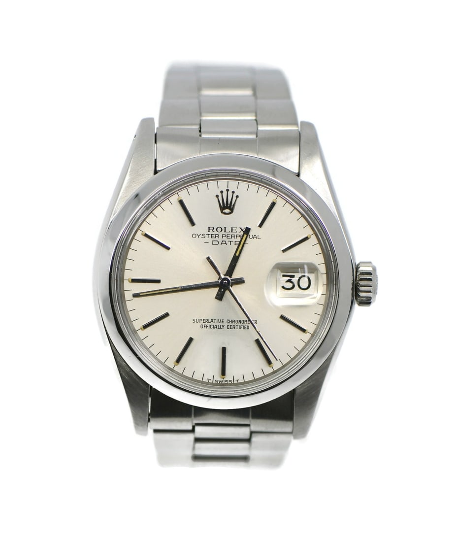 Rolex Oyster Perpetual Date 1500 Stainless Steel Wristwatch: Rolex Oyster Perpetual Date 1500 Stainless Steel Wristwatch This Rolex Oyster Perpetual Date wristwatch, reference 1500, features a 34 mm polished stainless steel case and a smooth silver bezel. The s