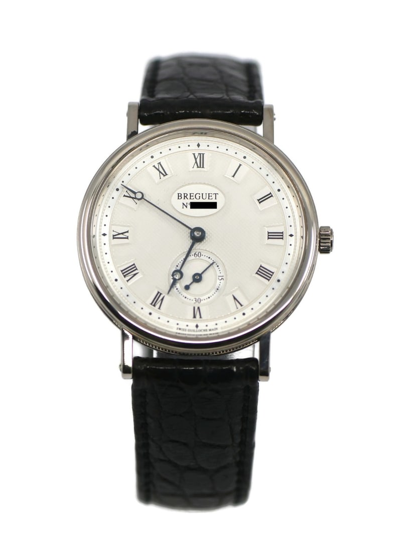 Breguet 3910 Classique men's 18K white gold wristwatch: Breguet 3910 Classique men's 18K white gold wristwatch Breguet Classique 18K White Gold wristwatch, reference 3910, with a manual mechanical movement and analog display. It features a white dial with 