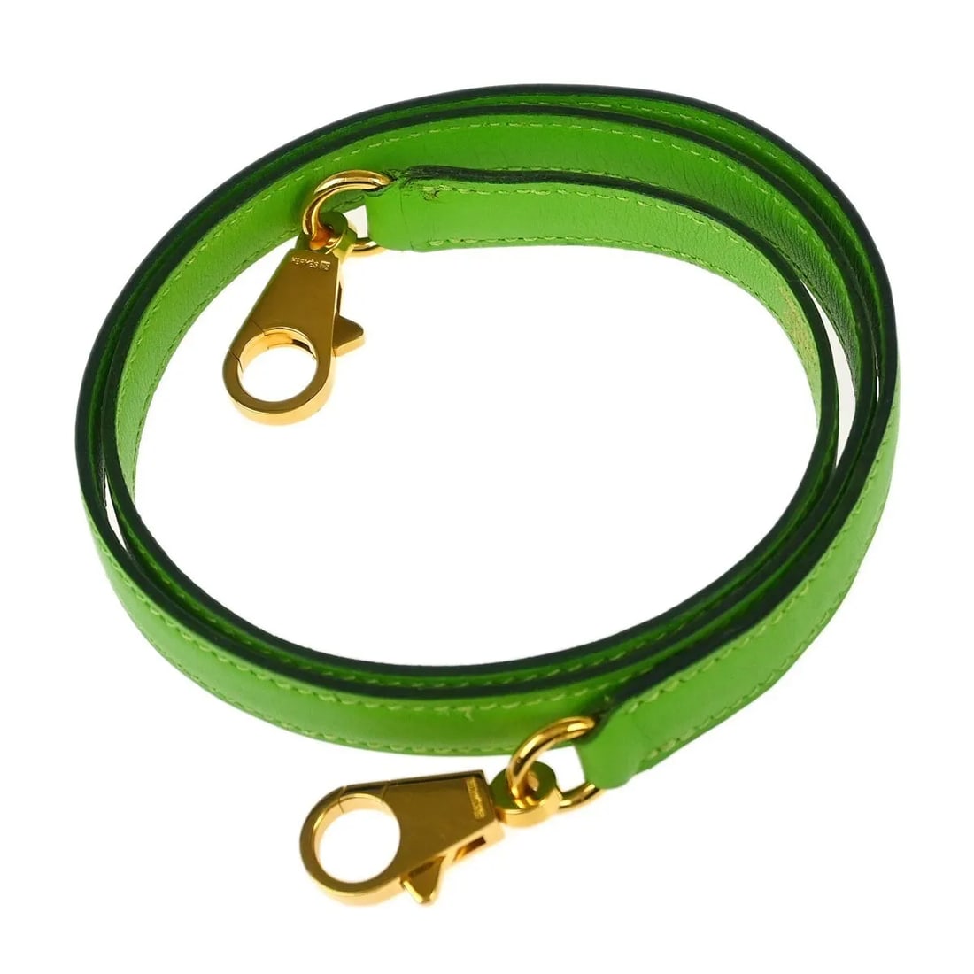 Green Leather Kelly Shoulder Strap by Hermes Unisex: Green Leather Kelly Shoulder Strap by Hermes Unisex Hermes Kelly shoulder strap crafted from green leather, suitable for unisex use. This strap is in very good condition with minor signs of use and no