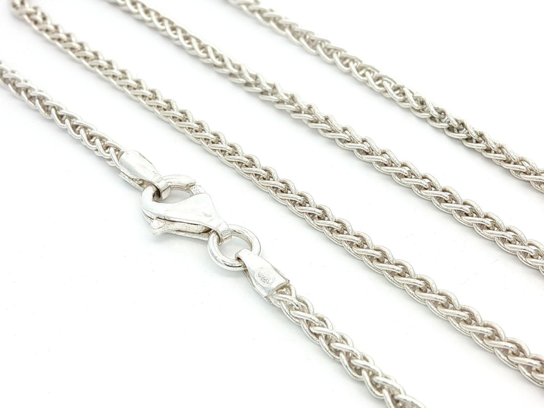 Unisex 1.90mm Wheat Link 18 Inch Sterling Silver Chain Necklace: Unisex 1.90mm Wheat Link 18 Inch Sterling Silver Chain Necklace This unisex classic chain necklace features a sleek 1.90mm wheat link design, crafted from high-quality sterling silver. The necklace me