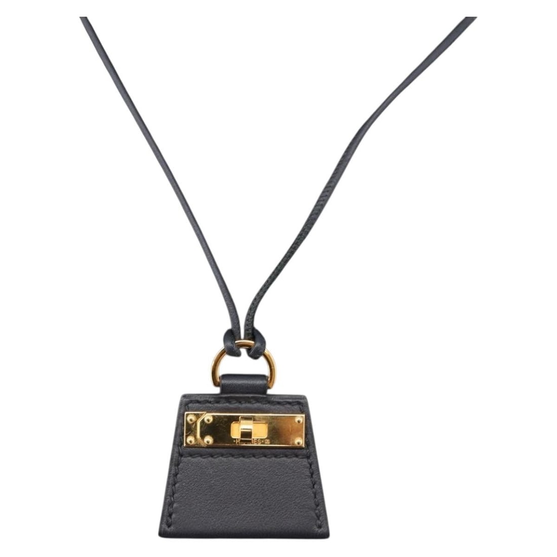Hermes Mon Petit Kelly PM Black Leather Necklace: Hermes Mon Petit Kelly PM Black Leather Necklace A Hermes Mon Petit Kelly PM necklace in black leather, made in France. The piece measures approximately 36 cm in total length (14.2 inches). It is offe