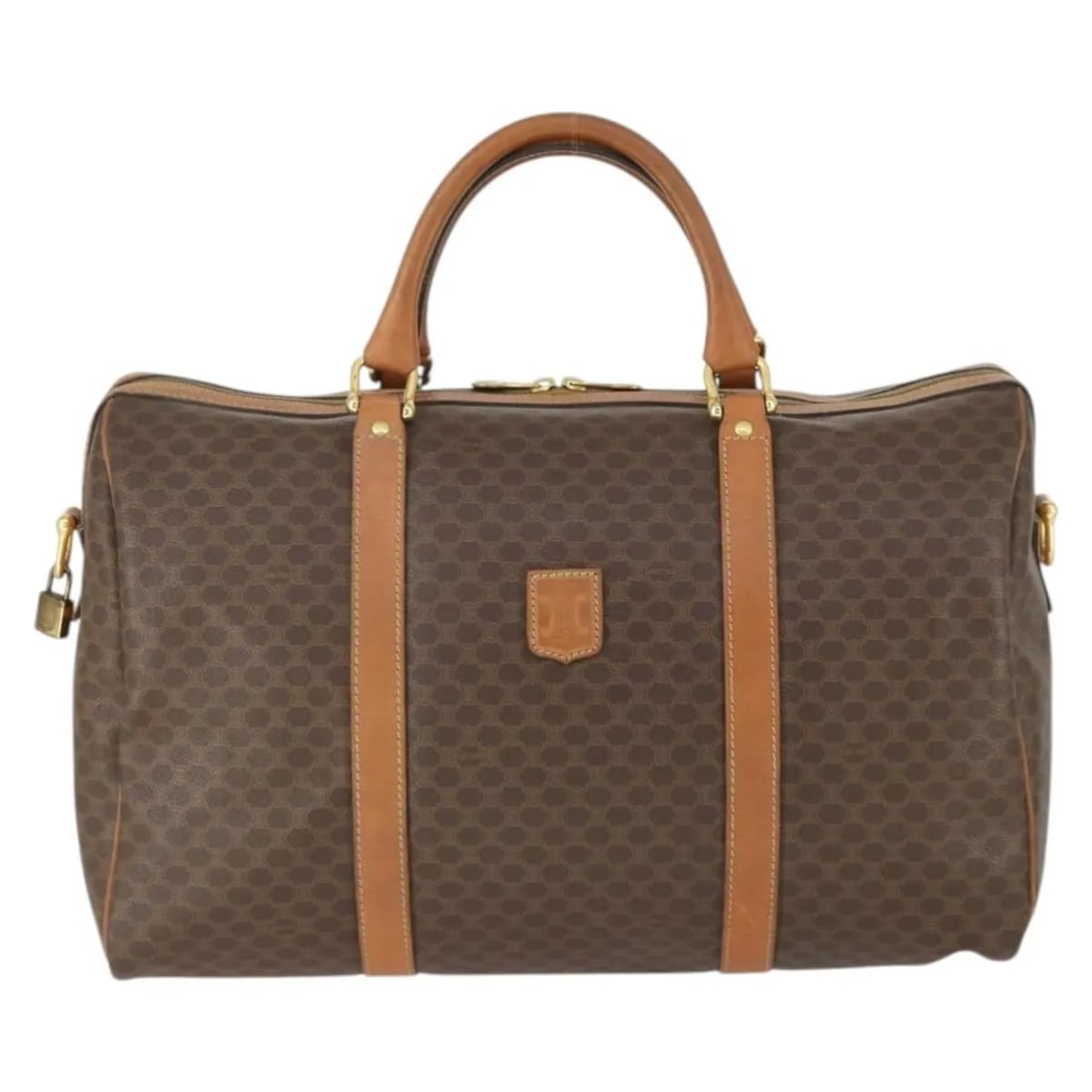 Celine Macadam Vintage Boston Bag in Brown Canvas and Leather: Celine Macadam Vintage Boston Bag in Brown Canvas and Leather This Celine Vintage Macadam Boston bag is crafted from durable brown PVC canvas with leather accents. Designed for women, it features a sp