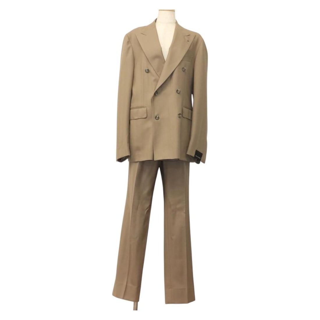 TAGLIATORE Beige Wool Jacket and Slacks Set Made in Italy: TAGLIATORE Beige Wool Jacket and Slacks Set Made in Italy TAGLIATORE double-breasted jacket and slacks set in beige wool, made in Italy. The set is listed for women and includes a tie pin. Condition i