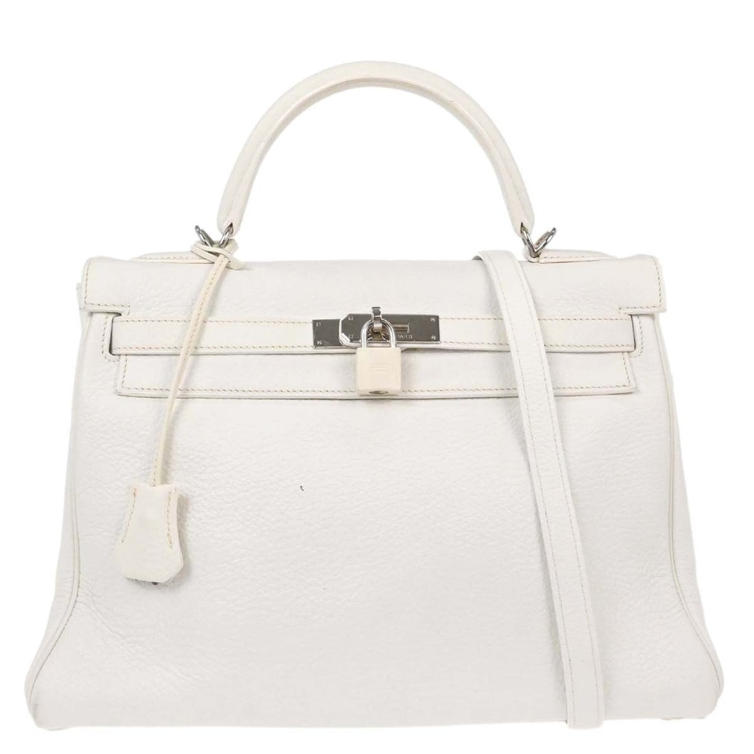 Hermes Kelly 32 Retourne White Taurillon Clemence 2way Bag: Hermes Kelly 32 Retourne White Taurillon Clemence 2way Bag Hermes Kelly 32 Retourne 2-way handbag in white Taurillon Clemence leather. This medium top handle bag features a turn-lock closure and silve