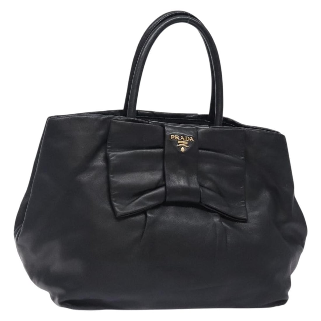 PRADA Ribbon Leather Handbag Black and Gold Made in Italy: PRADA Ribbon Leather Handbag Black and Gold Made in Italy Prada ribbon handbag in black leather with gold-tone accents. Made in Italy, this women's handbag shows reasonable wear and tear consistent wi