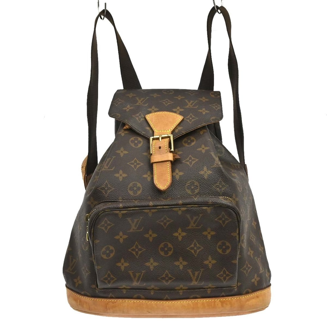 Louis Vuitton Montsouris GM Monogram Canvas Backpack M51135: Louis Vuitton Montsouris GM Monogram Canvas Backpack M51135 Vintage Louis Vuitton Montsouris GM backpack in brown Monogram canvas with leather trim. This unisex backpack features a buckle and drawstri
