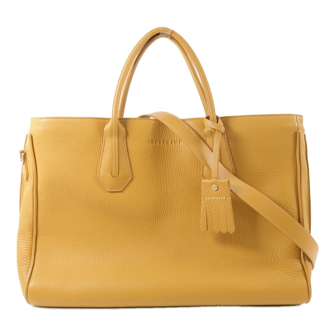 Longchamp Penelope calfskin leather 2-way tote shoulder bag pale gold: Longchamp Penelope calfskin leather 2-way tote shoulder bag pale gold A Longchamp Penelope 2way shoulder bag tote crafted from calfskin (cowhide) leather in a very pale gold color. This women's regula