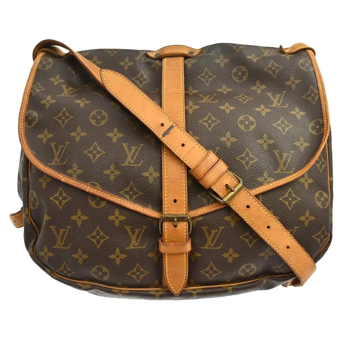 Louis Vuitton Saumur shoulder bag in brown monogram canvas: Louis Vuitton Saumur shoulder bag in brown monogram canvas Louis Vuitton Saumur in brown canvas with a unisex design. This bag is in good condition with visible wear, including scuffs, scratches, a cr