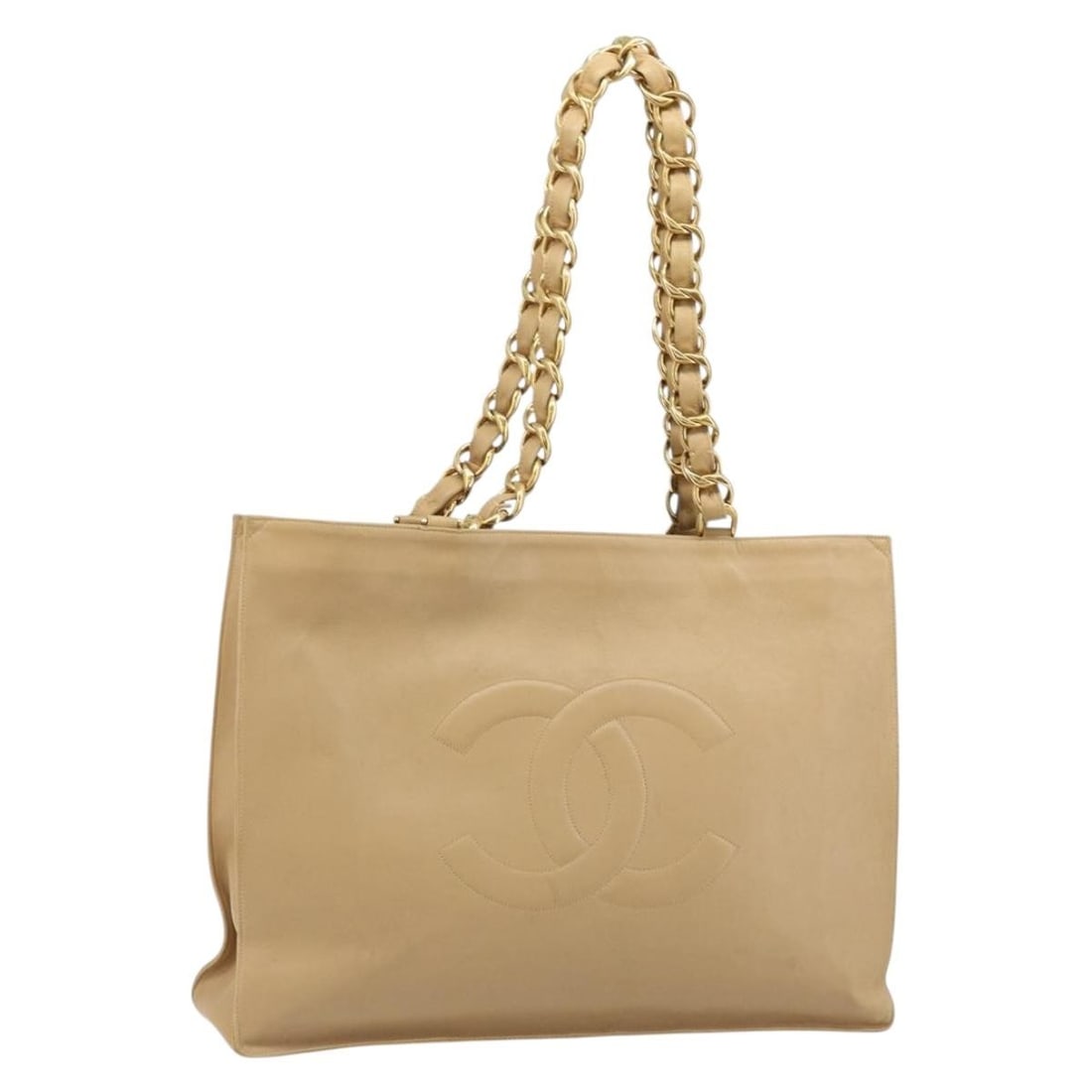 CHANEL Beige Leather Tote Bag with Gold CC: CHANEL Beige Leather Tote Bag with Gold CC Chanel tote bag in beige and gold leather, made in France. This women's bag is offered without the original box or dust bag; only the item shown is included.