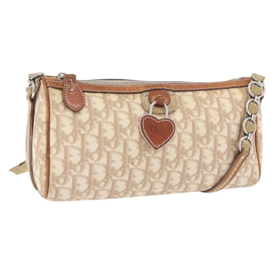 Christian Dior Romantic Trotter Shoulder Bag Beige PVC Canvas Silver Tone: Christian Dior Romantic Trotter Shoulder Bag Beige PVC Canvas Silver Tone Christian Dior Trotter Canvas Romantic shoulder bag in beige and silver, made in Italy. It is crafted from PVC leather and Tro