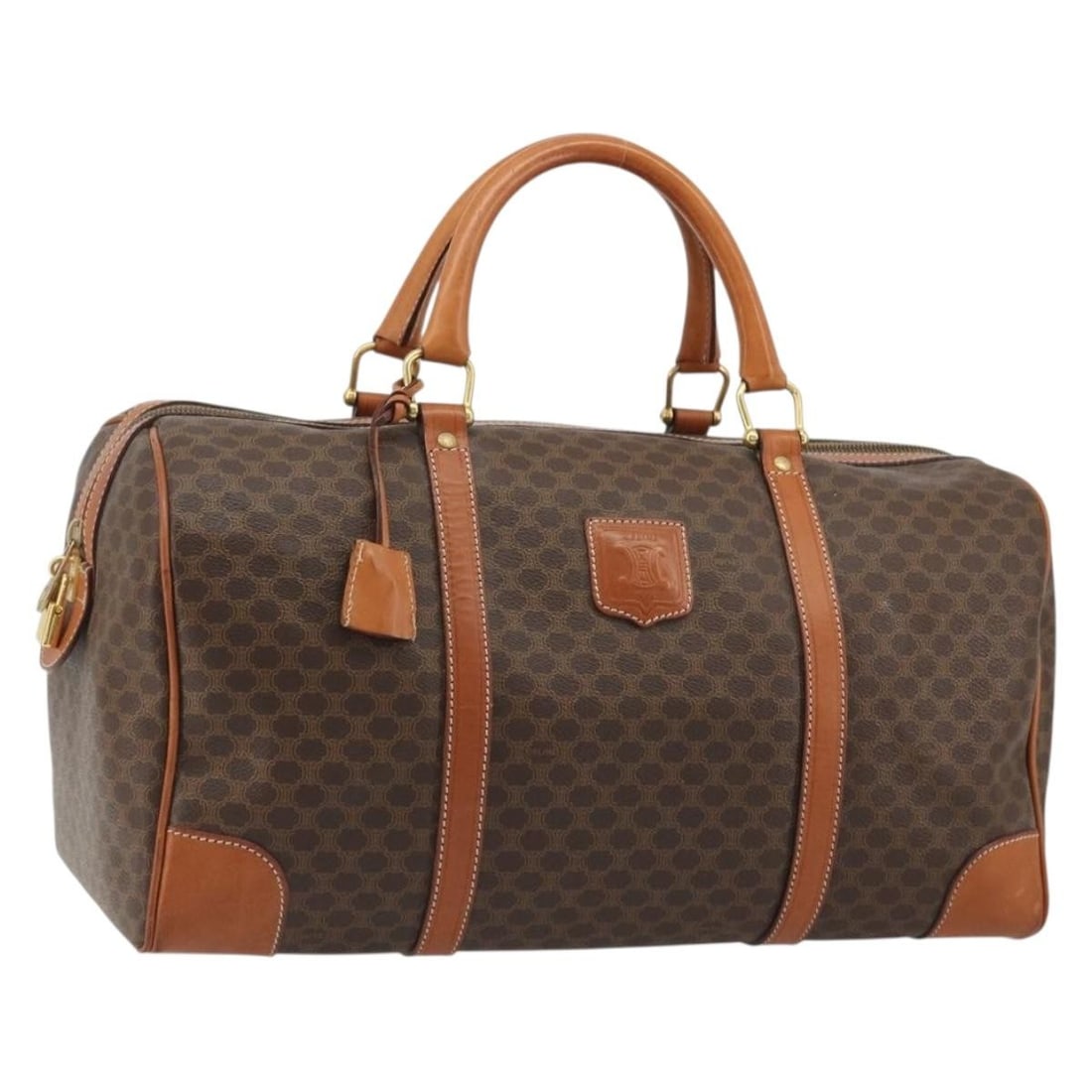 CELINE Macadam Boston Bag Brown PVC Leather with Padlock Key Clochette: CELINE Macadam Boston Bag Brown PVC Leather with Padlock Key Clochette CELINE Macadam Canvas Boston Bag in brown and gold PVC leather and Macadam canvas. Made in Italy, this women's Boston Bag feature