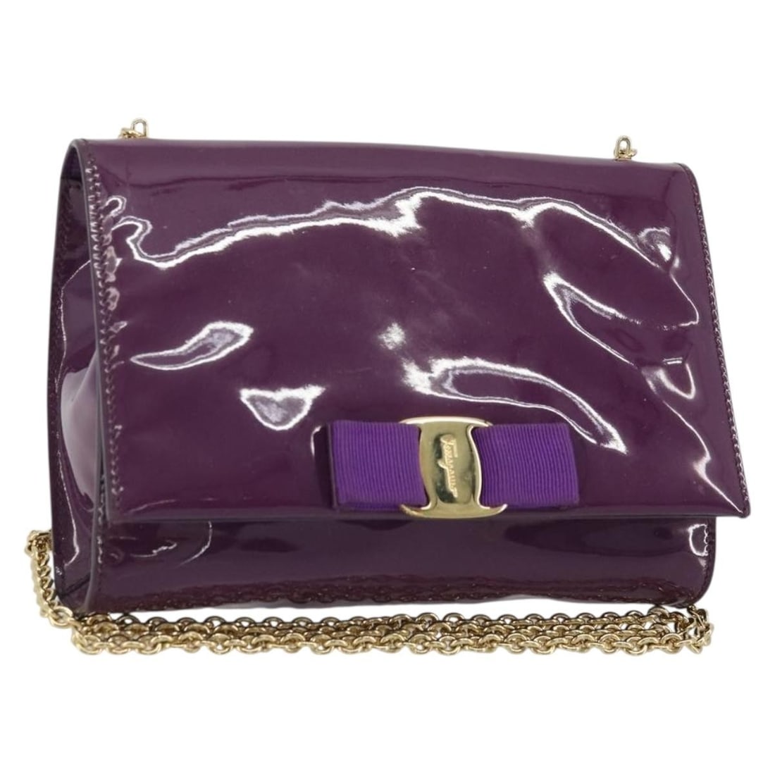 Ferragamo Vala Purple Patent Leather Chain Shoulder Bag Gold Hardware: Ferragamo Vala Purple Patent Leather Chain Shoulder Bag Gold Hardware This Salvatore Ferragamo Vala Chain shoulder bag is crafted from glossy purple patent leather with gold-tone accents. Designed for
