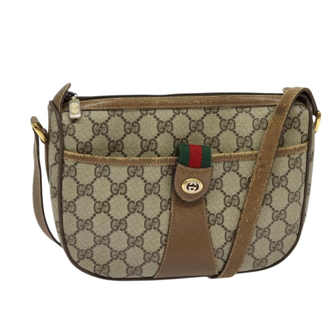 Gucci Sherry Line GG Supreme Beige PVC Shoulder Bag: Gucci Sherry Line GG Supreme Beige PVC Shoulder Bag This Gucci GG Supreme Web Sherry Line shoulder bag features a beige and gold PVC leather exterior with GG canvas accents. The bag is designed for wo