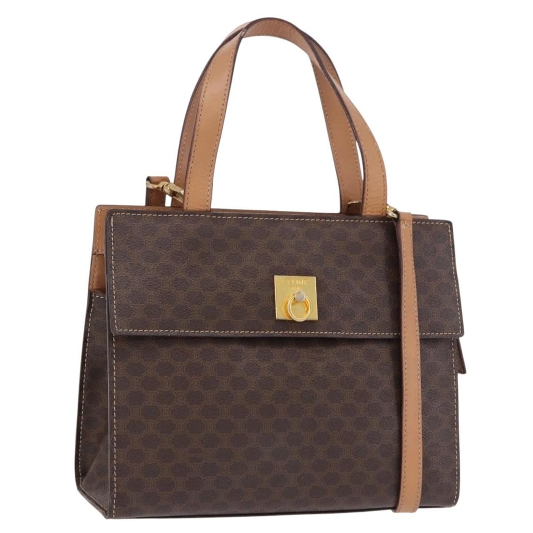 CELINE Macadam 2way Brown PVC Leather Handbag with Shoulder Strap: CELINE Macadam 2way Brown PVC Leather Handbag with Shoulder Strap A CELINE Macadam canvas handbag in brown and gold, made from PVC leather and Macadam canvas. This 2-way style comes with a shoulder st
