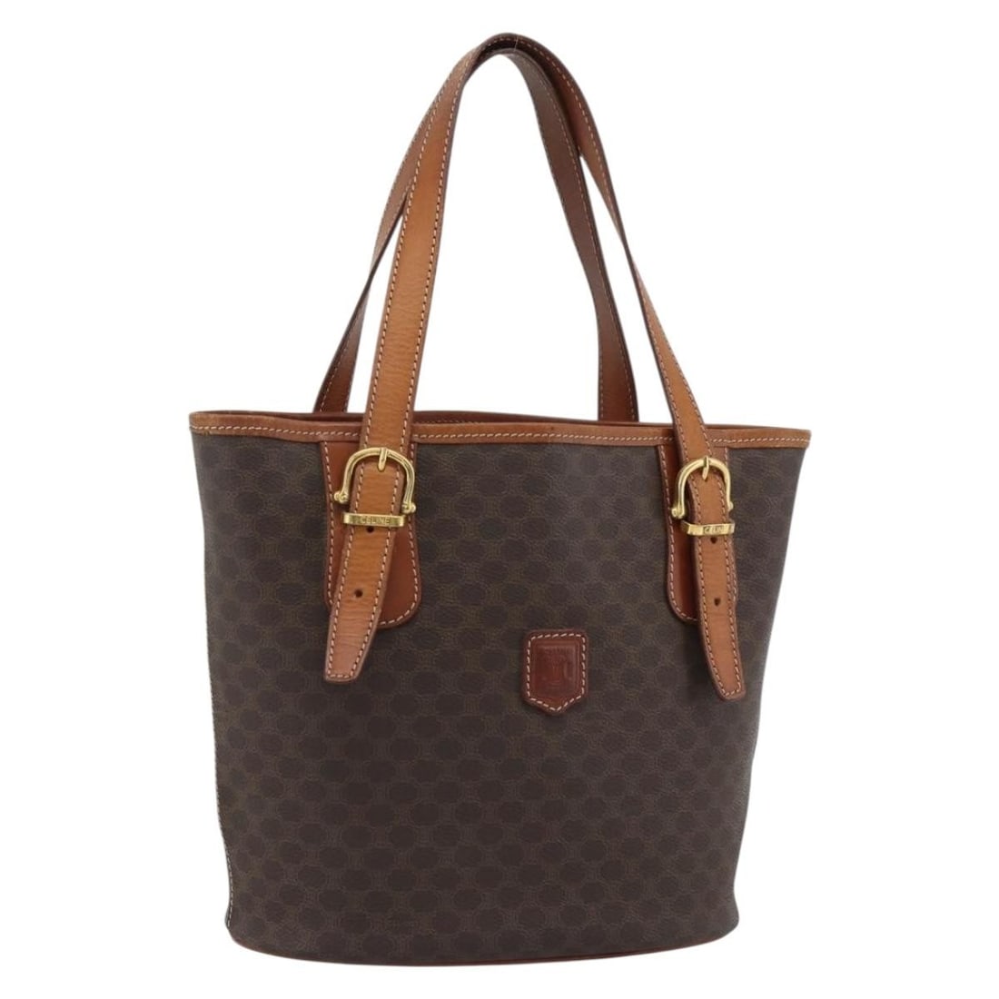Celine Macadam Canvas and PVC Leather Shoulder Bag Brown Gold Tone: Celine Macadam Canvas and PVC Leather Shoulder Bag Brown Gold Tone A CELINE shoulder bag in brown and gold, made from PVC leather and Macadam canvas. It features a structured silhouette with handle dr