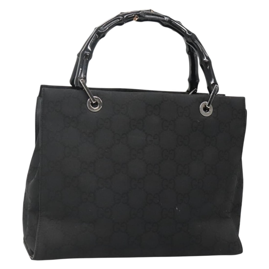 Gucci Bamboo GG Canvas Black Nylon Handbag 002 1016: Gucci Bamboo GG Canvas Black Nylon Handbag 002 1016 This GUCCI Bamboo GG Canvas Hand Bag features a stylish combination of black nylon and signature GG canvas. Designed for women, the bag is made in I